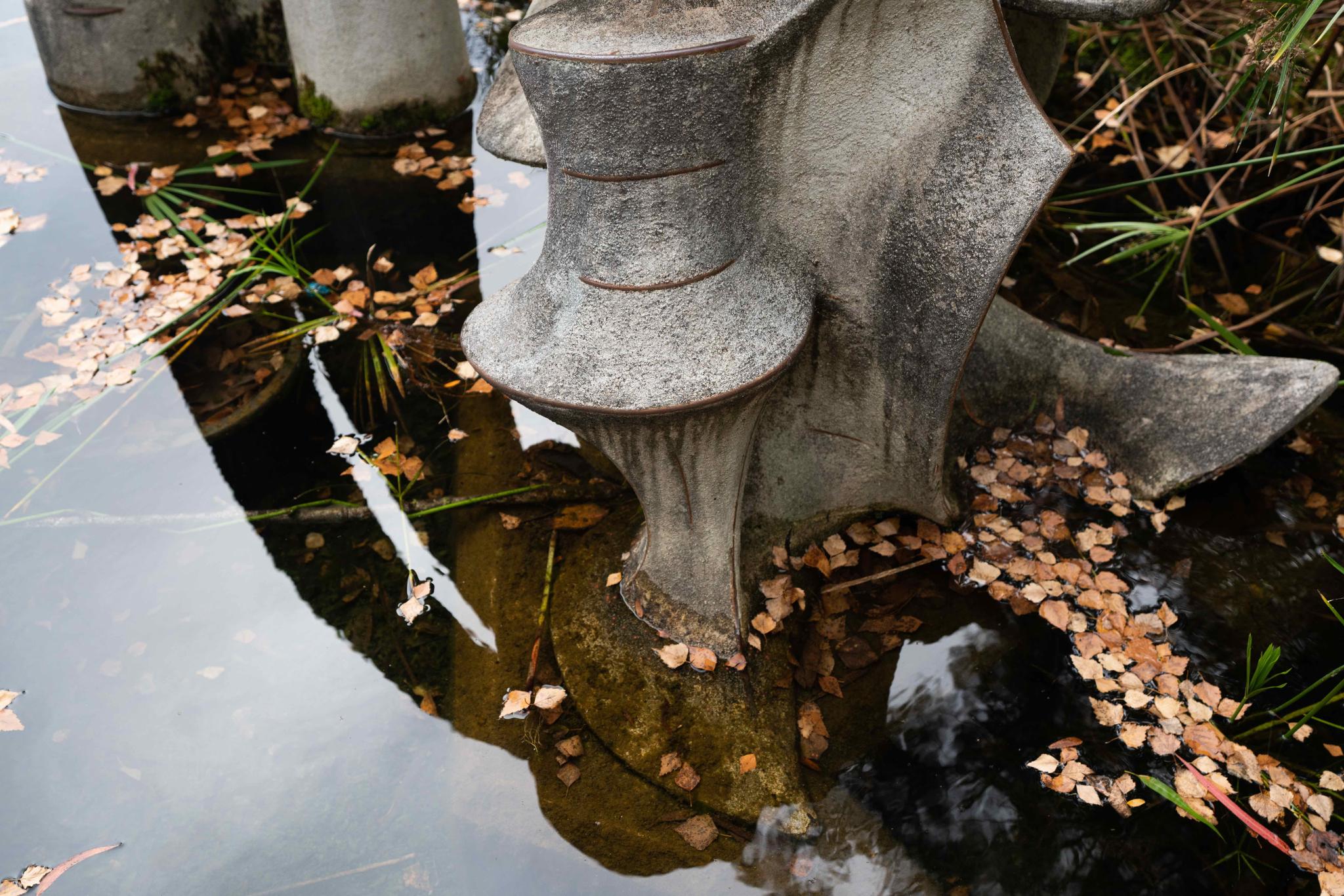 Sculptural structure within pond