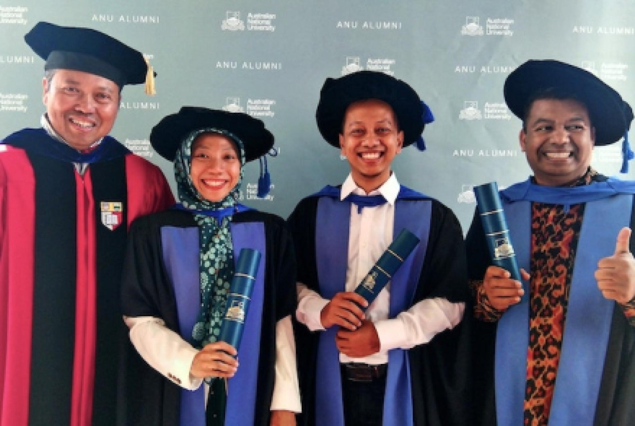 Professor Budy Resosudarmo, Dr Anna Falentina, Dr Rus’an Nasrudin and Dr Umbu Raya at 2019 graduation ceremony.