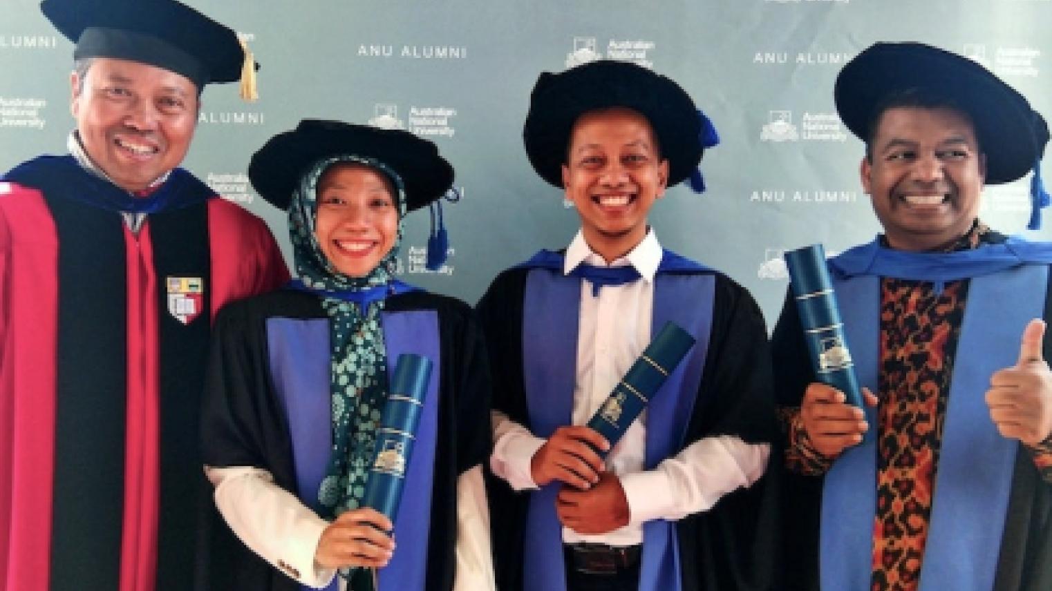 Professor Budy Resosudarmo, Dr Anna Falentina, Dr Rus’an Nasrudin and Dr Umbu Raya at 2019 graduation ceremony.